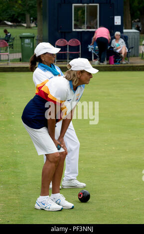 Players watching a delivery at the national women`s lawn bowls championships, Leamington Spa, UK Stock Photo